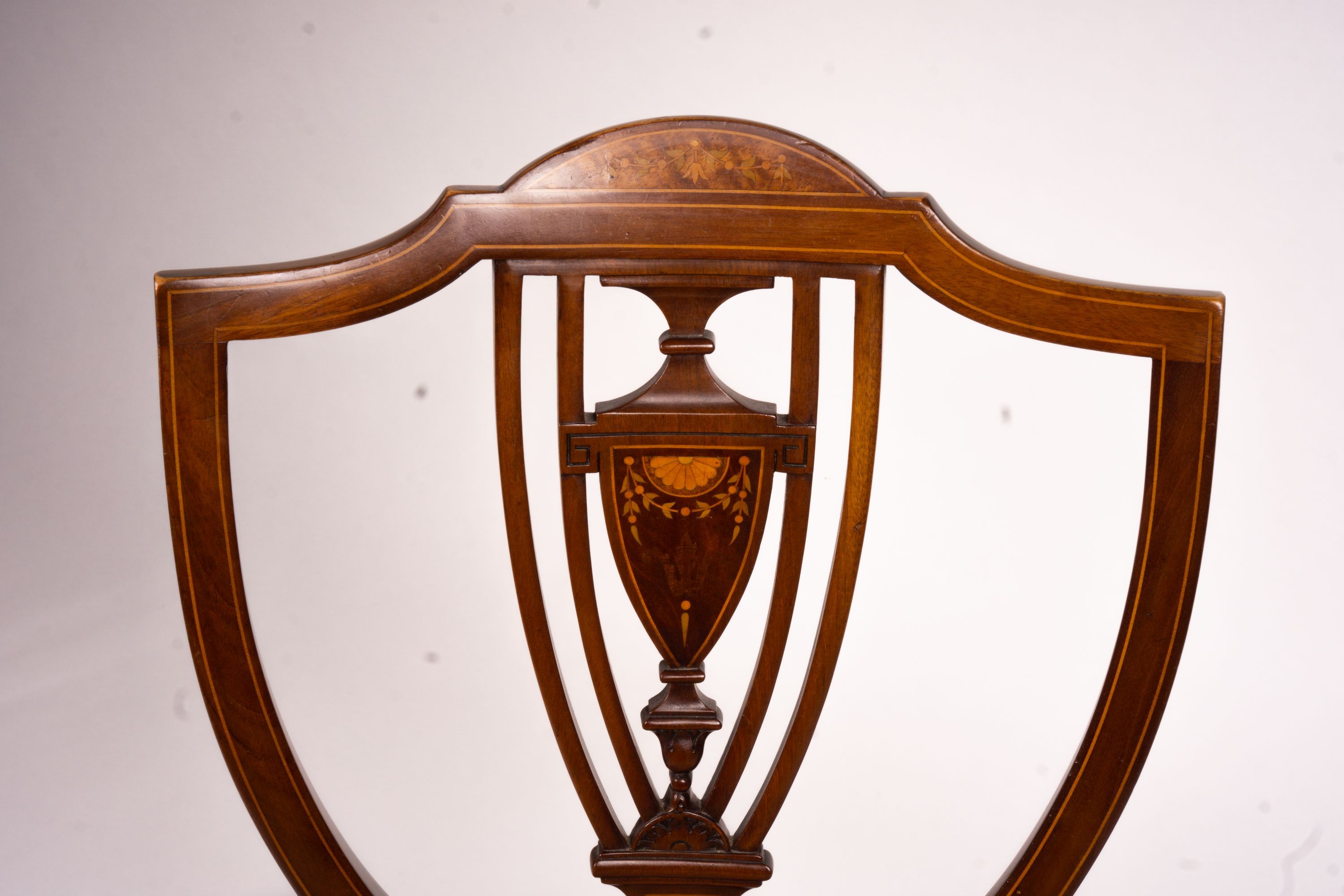 An Edwardian marquetry inlaid elbow chair (AF) and a side chair